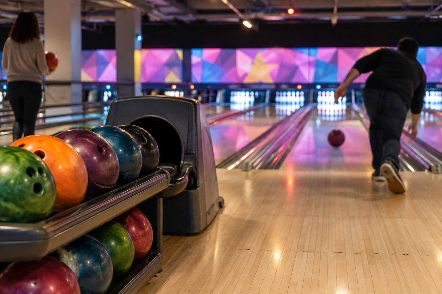 Bowling lanes and ball racks illustrating Hollywood Bowl dynamic pricing at UK venues